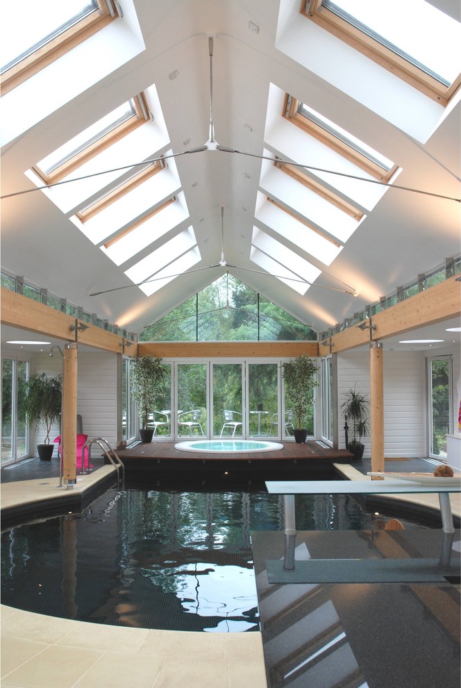 Example of a trendy indoor pool design in Berkshire
