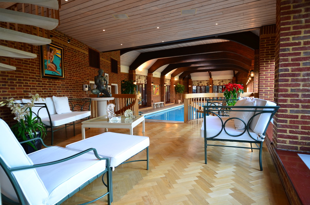 Huge elegant indoor rectangular pool house photo in London