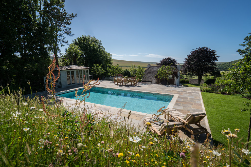 Design ideas for a medium sized rural swimming pool in Sussex.