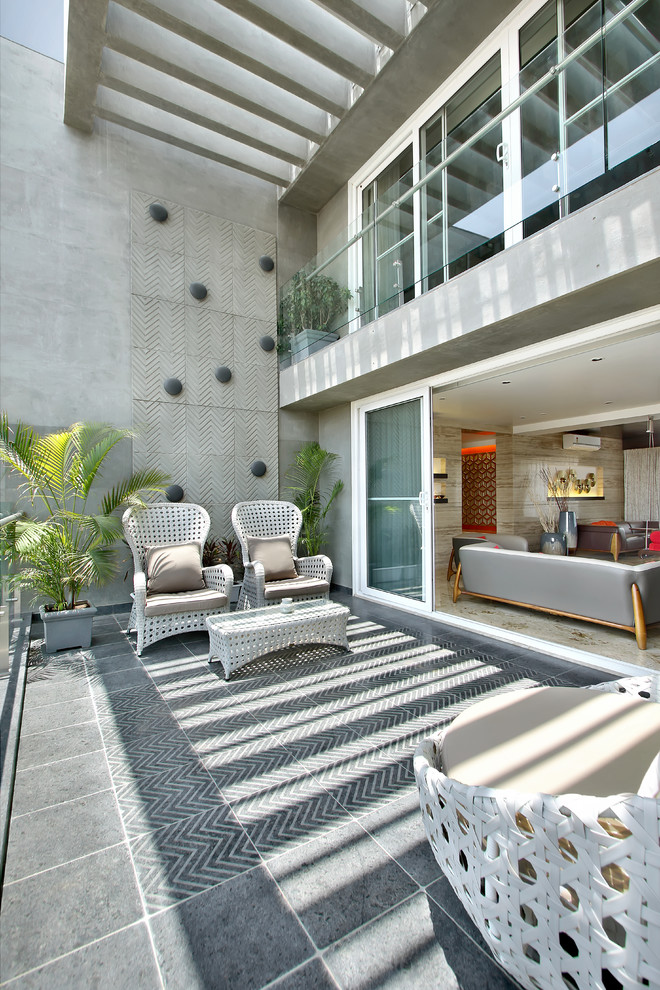 Design ideas for a contemporary balcony in Other.
