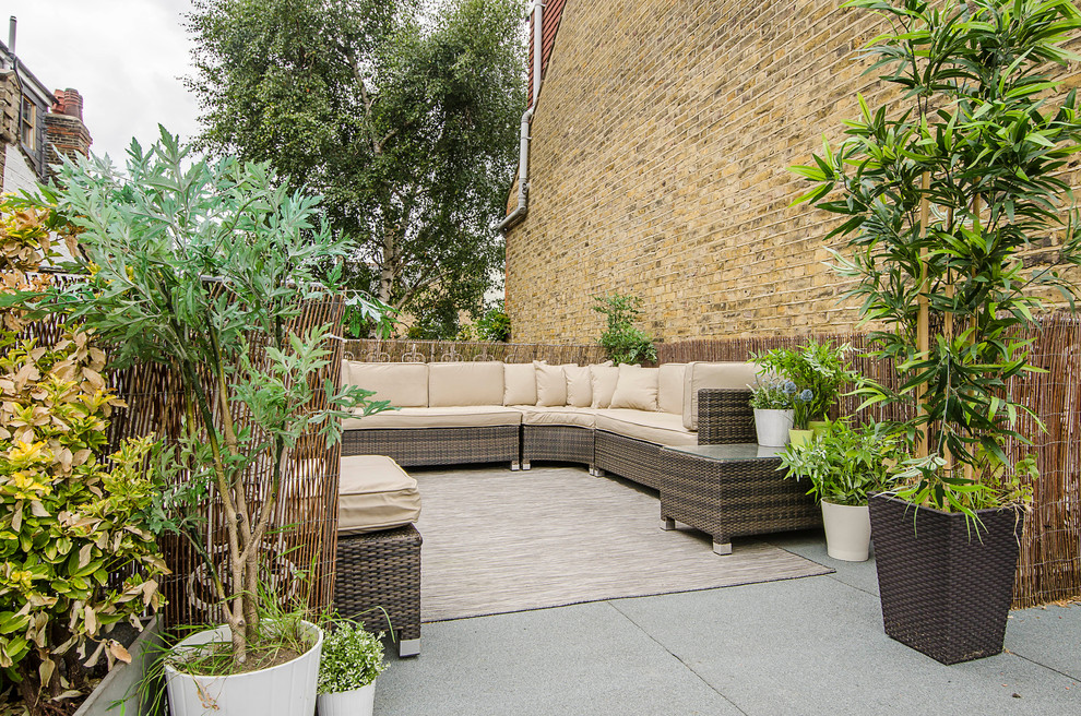 Imagen de patio moderno de tamaño medio sin cubierta
