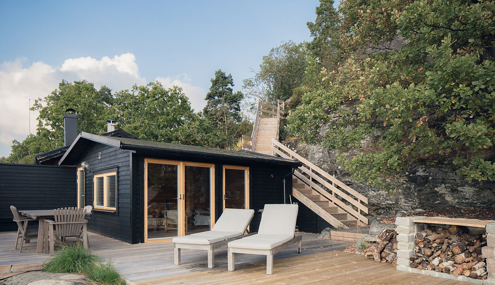 Inspiration for a small rustic rooftop rooftop deck remodel in Stockholm with no cover