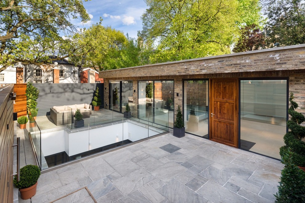 Photo of a contemporary terrace in London with no cover.