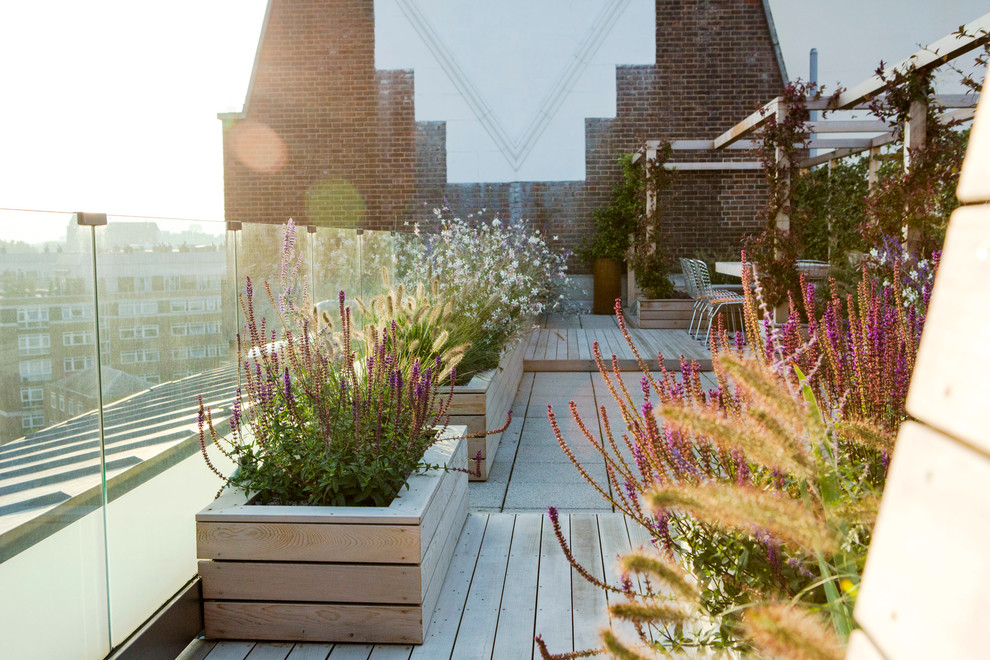 Design ideas for a large contemporary roof rooftop terrace in London.