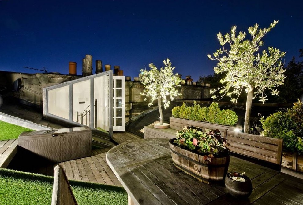 Ispirazione per una terrazza minimal di medie dimensioni e sul tetto con nessuna copertura
