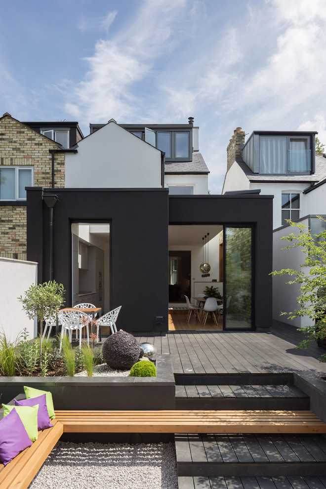 This is an example of a small contemporary back terrace in Other with no cover.