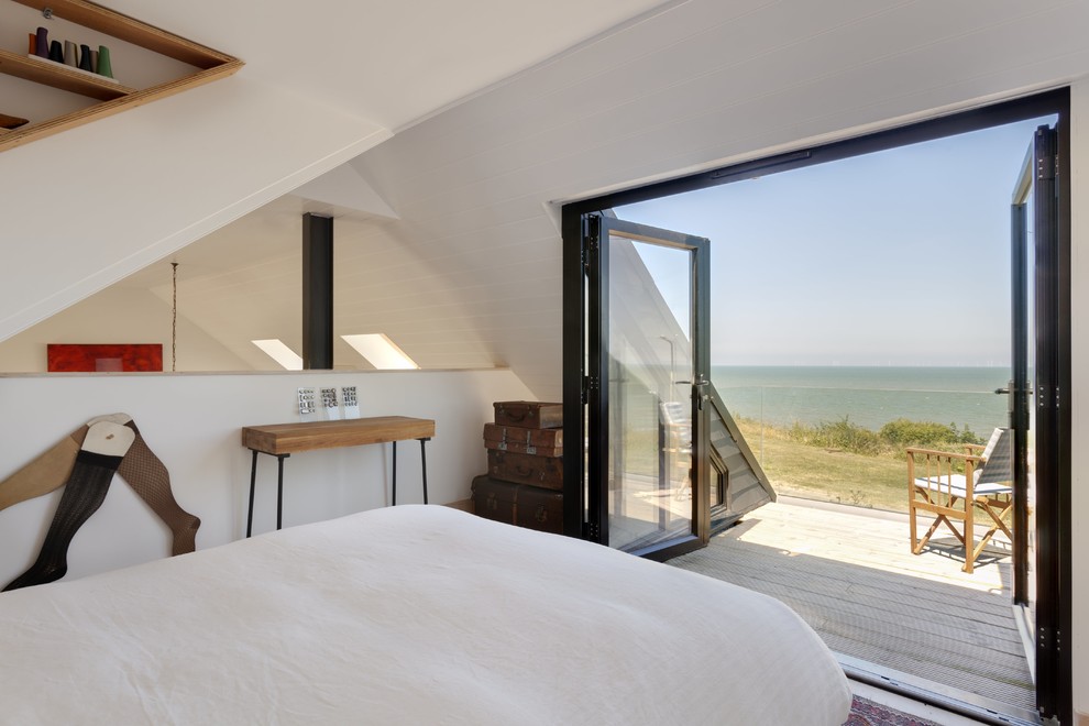 This is an example of a coastal bedroom in Kent.