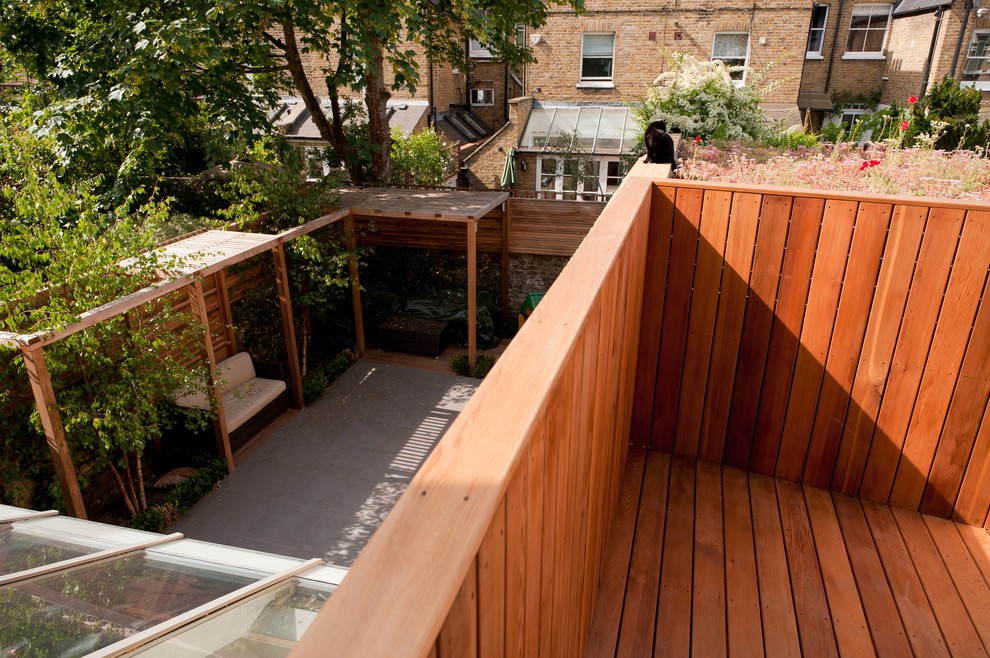 Inspiration for a large contemporary back terrace in London with no cover.