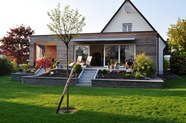 Anbau an bestehendes Wohnhaus Modern Terrasse Köln von Xylotec