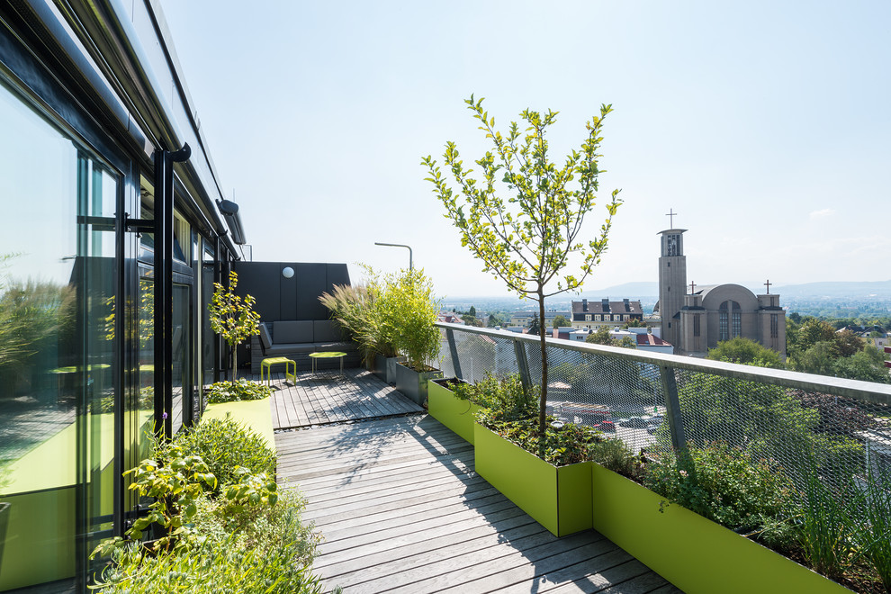 Inspiration for a contemporary rooftop deck remodel in Other