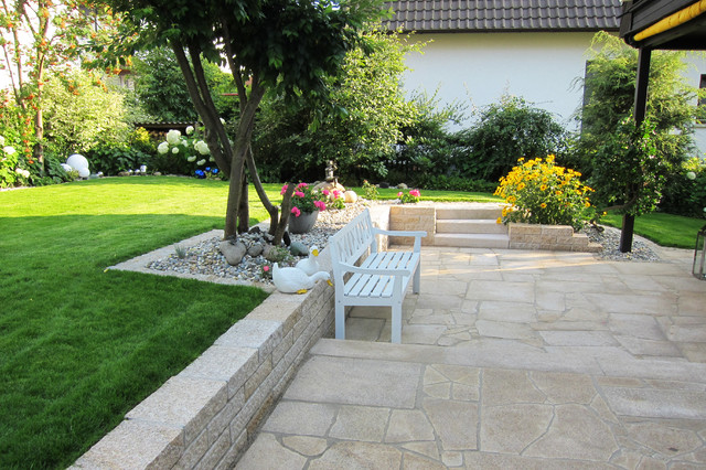 Eine Gartenanlage mit viel Liebe zum Detail. Campagne Terrasse en