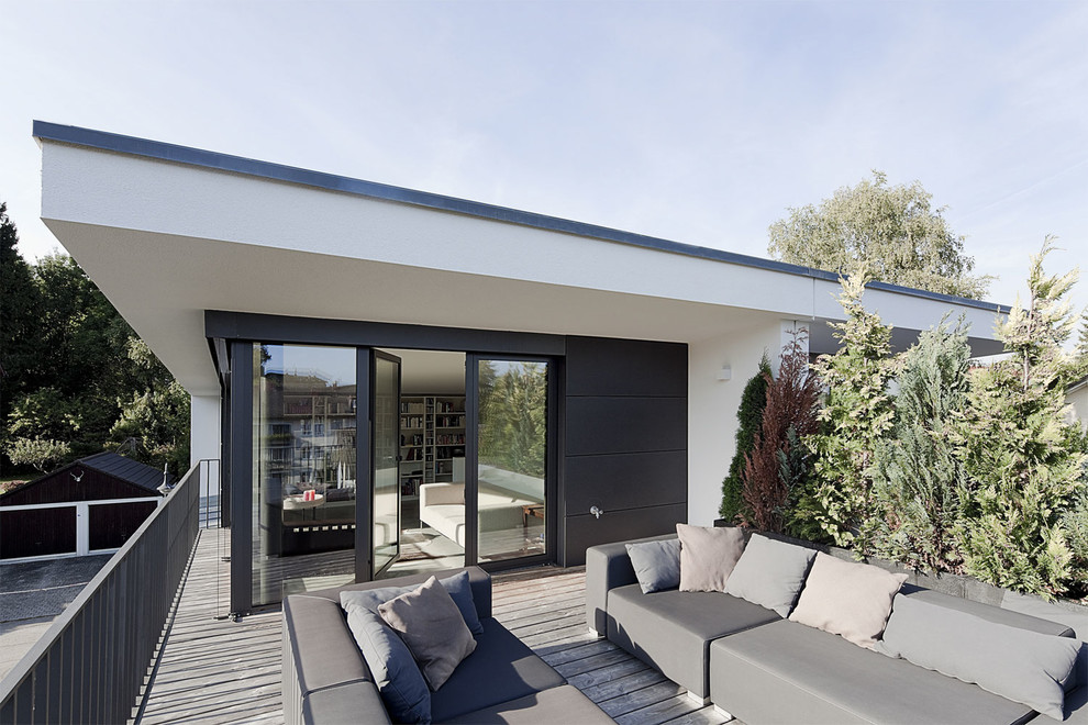 Inspiration för mellanstora moderna terrasser