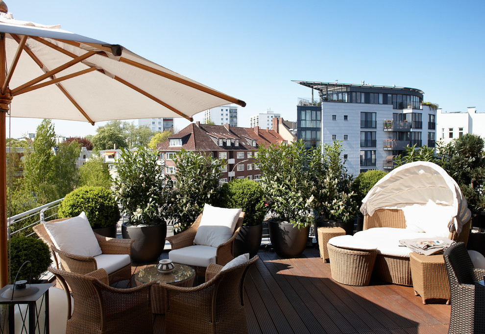 Design ideas for a large mediterranean roof rooftop terrace in Hamburg with a potted garden and no cover.