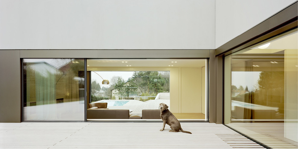 This is an example of an expansive contemporary terrace in Stuttgart with no cover.