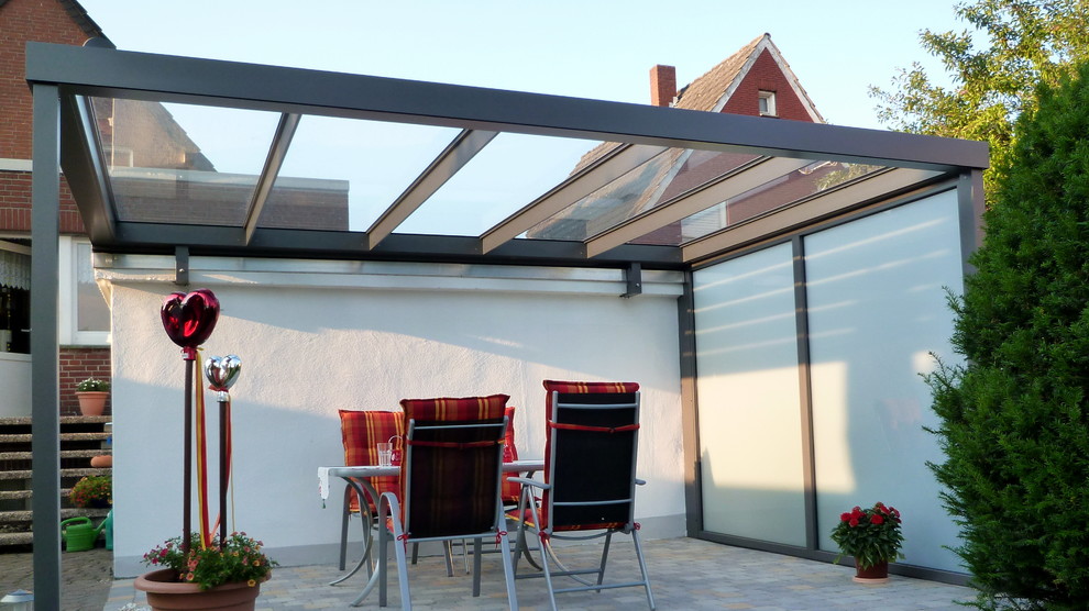 Design ideas for a modern terrace in Other with a roof extension.