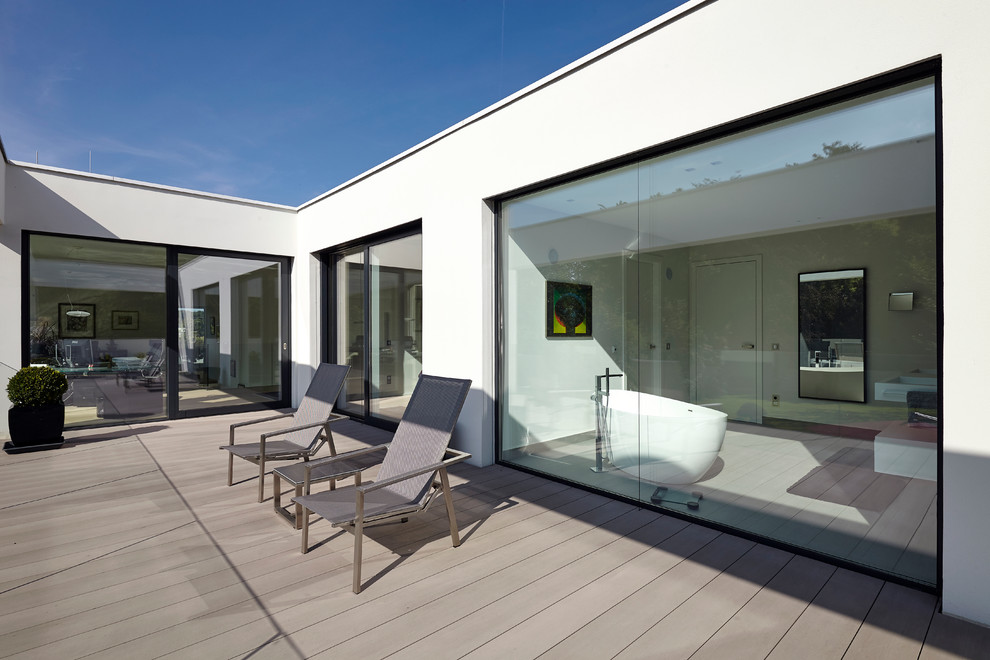 Diseño de terraza minimalista grande sin cubierta en azotea