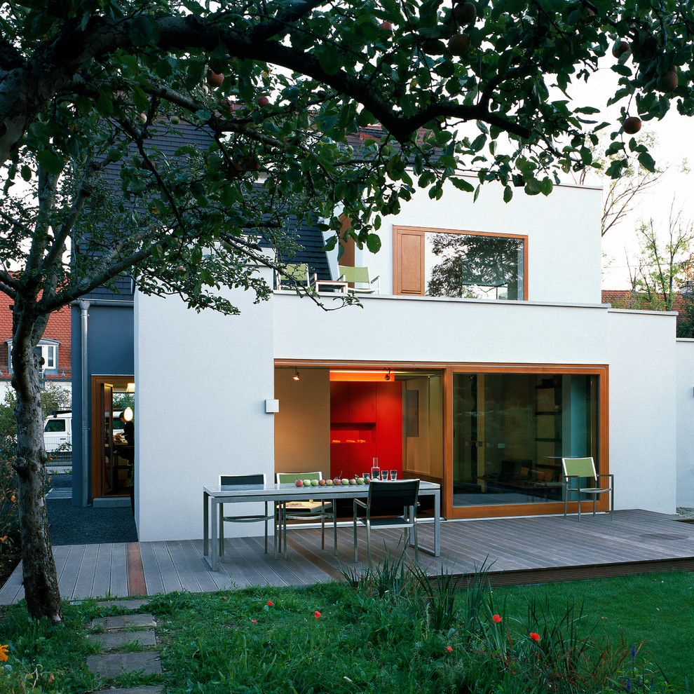 Inspiration for a large contemporary back terrace in Munich with no cover.
