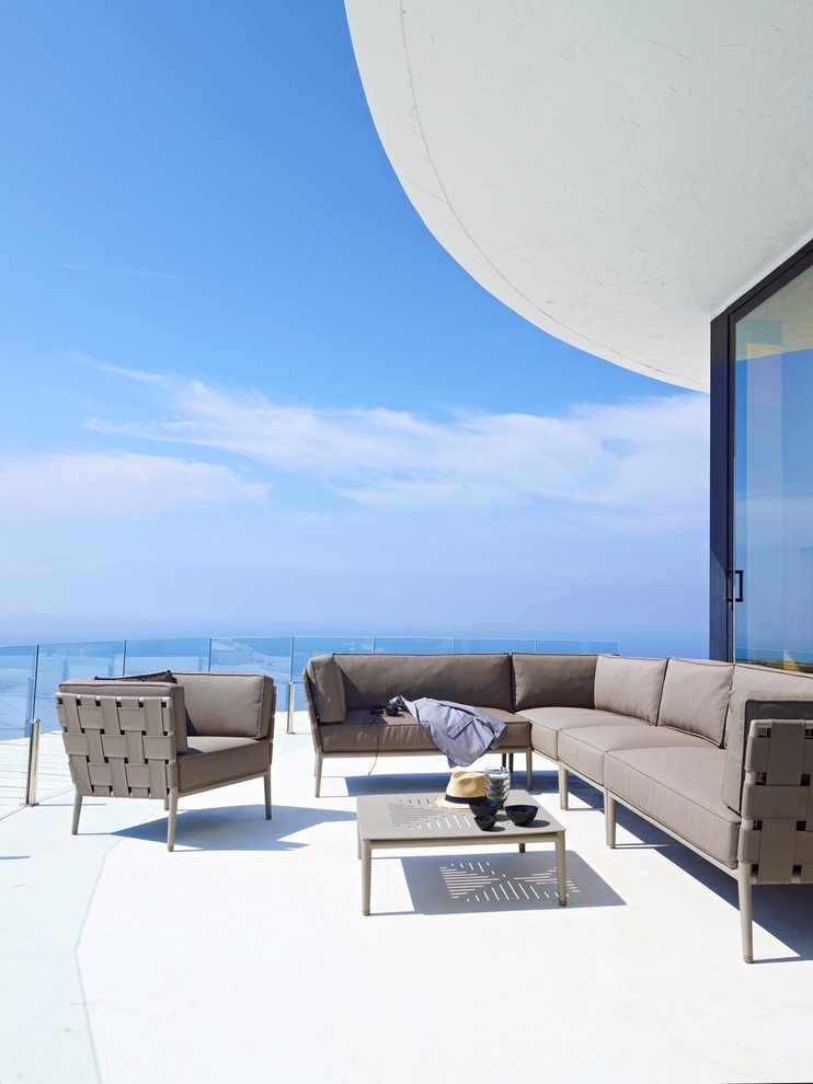 Foto de terraza minimalista grande en azotea y anexo de casas