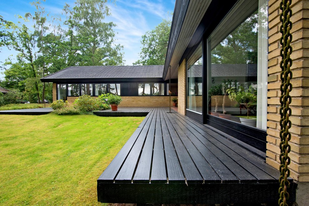 Bild på en minimalistisk terrass