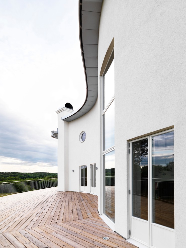 Foto på en mellanstor skandinavisk terrass på baksidan av huset