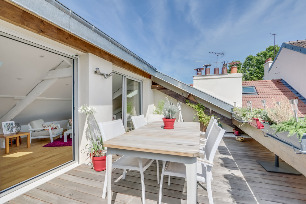 Mittelgroße, Unbedeckte Moderne Terrasse mit Kübelpflanzen in Paris