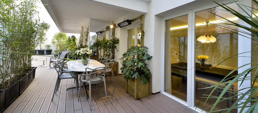 Источник вдохновения для домашнего уюта: терраса в современном стиле с растениями в контейнерах