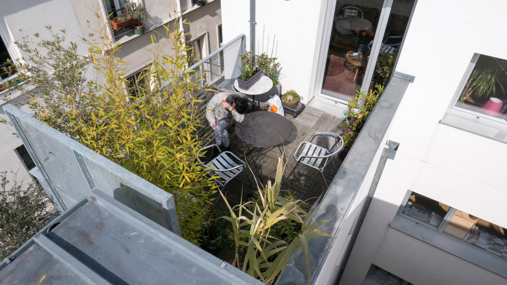 Immagine di una privacy sulla terrazza design sul tetto con nessuna copertura