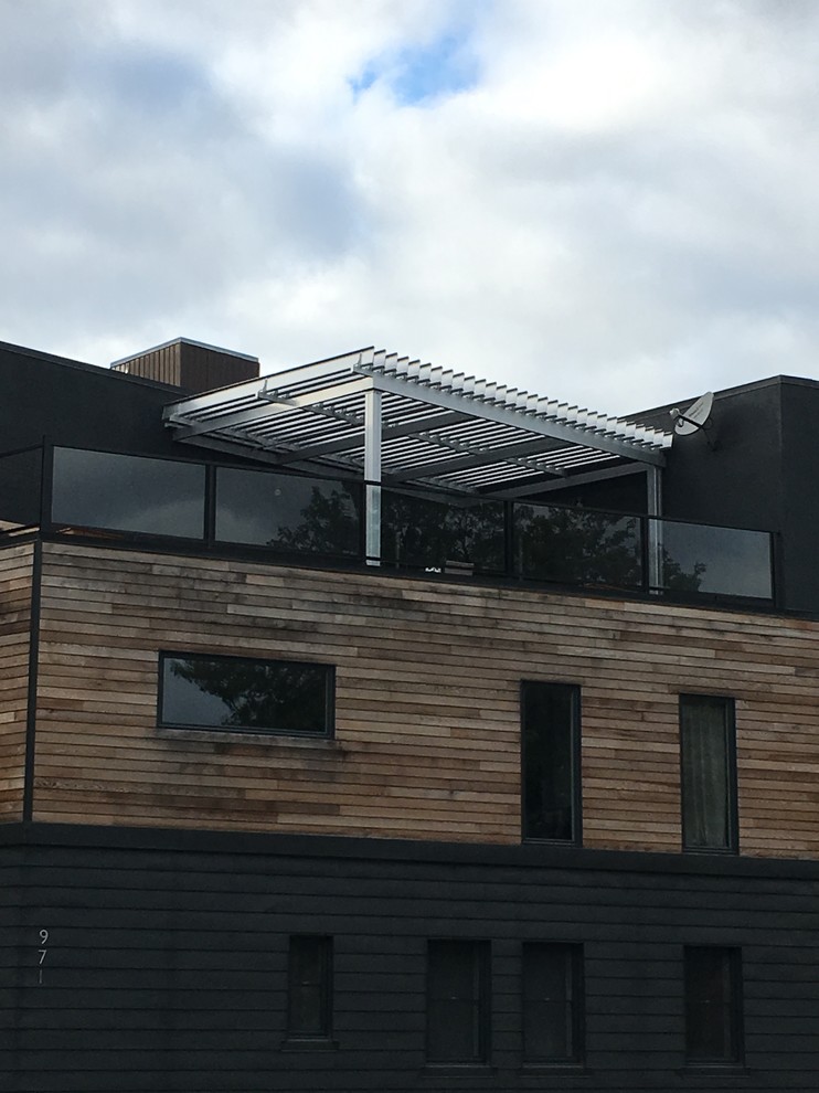 Pergolas on a roof top Transitional Patio Montreal by SunLouvre
