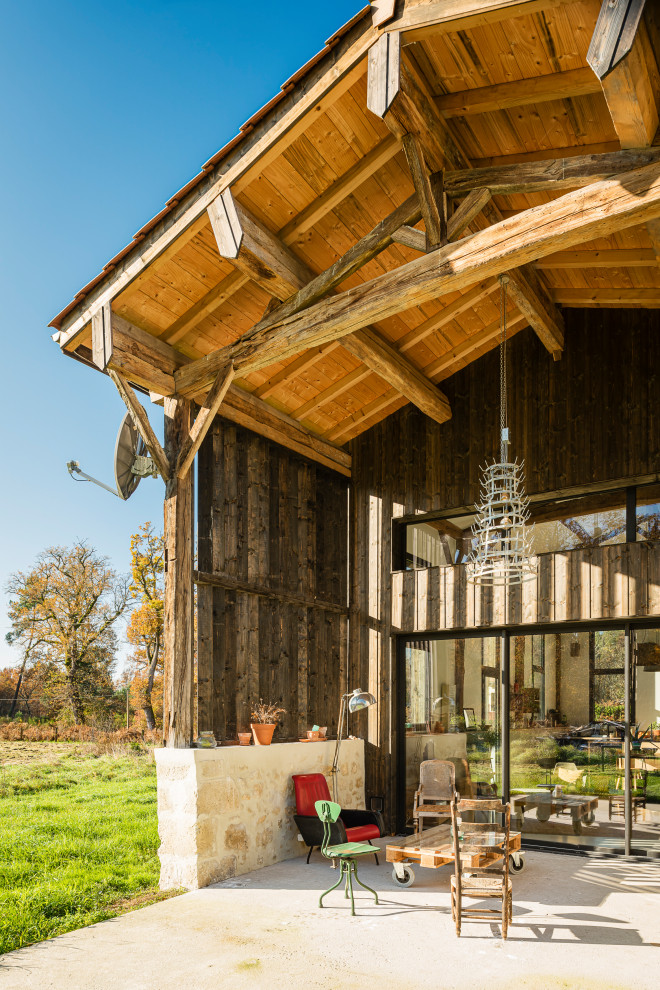 Unbedeckter Landhausstil Patio mit Betonplatten in Bordeaux