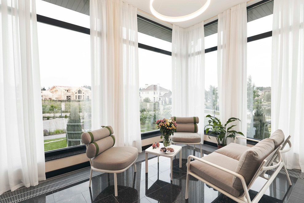 Photo of a large contemporary conservatory in Moscow with marble flooring, a standard ceiling and black floors.