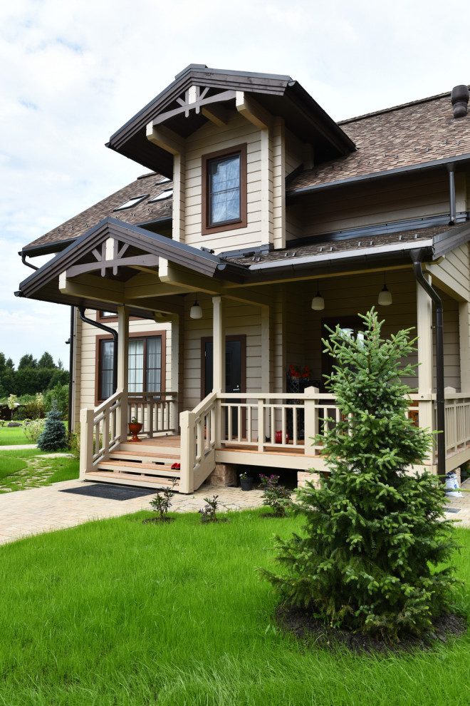 Foto di una terrazza country di medie dimensioni, in cortile e a piano terra con un tetto a sbalzo e parapetto in legno