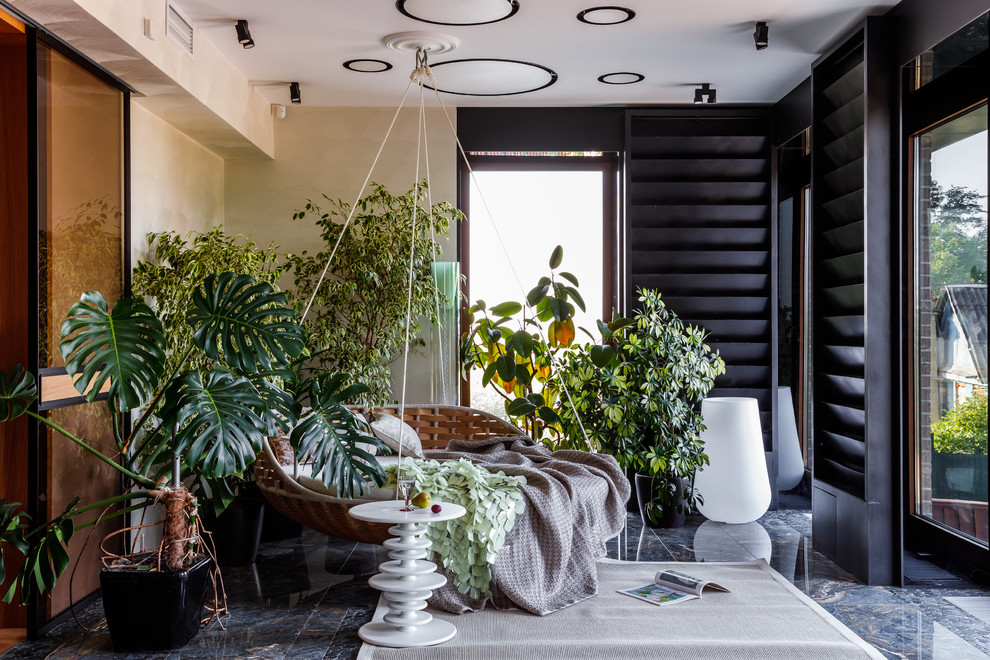 Foto di una veranda minimal con soffitto classico e pavimento grigio