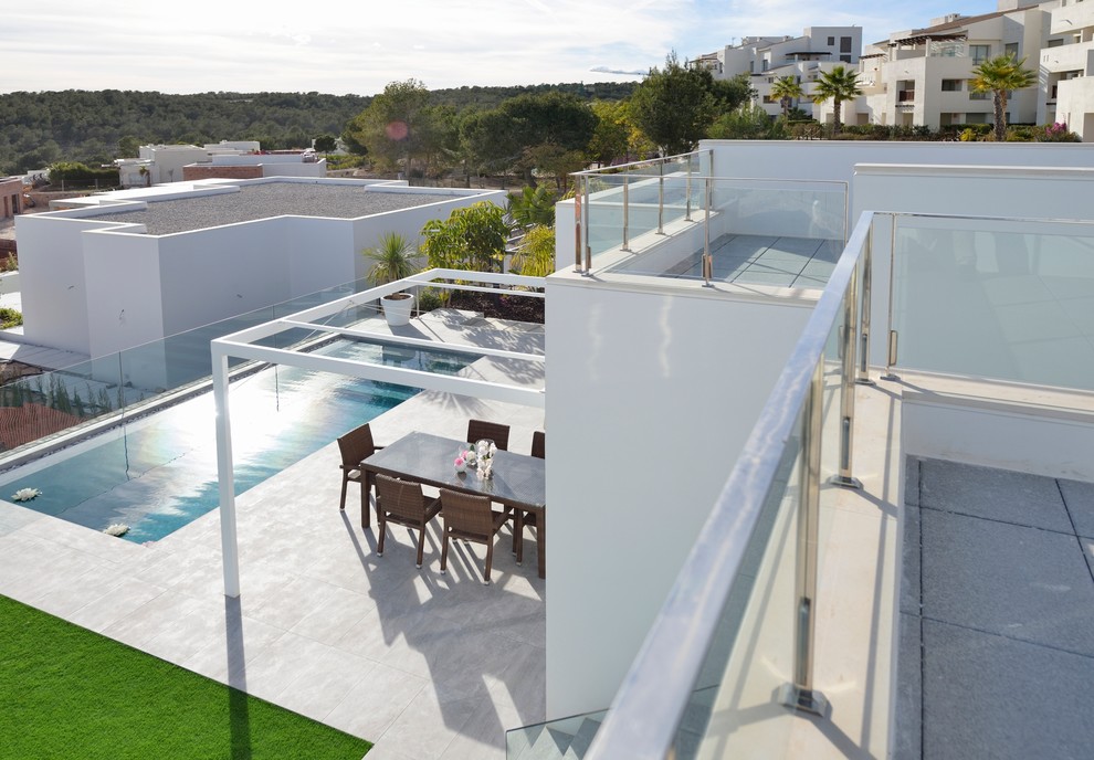 Mittelgroße Mediterrane Terrasse hinter dem Haus in Alicante-Costa Blanca