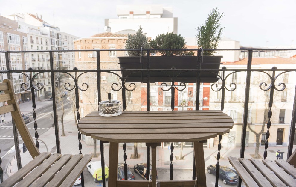 Photo of a small scandi terrace in Madrid.