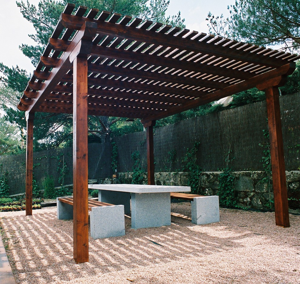 Medium sized contemporary veranda in Madrid with a pergola.