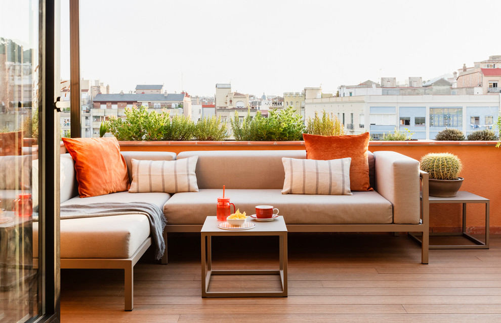 Foto de terraza contemporánea de tamaño medio en azotea con jardín de macetas