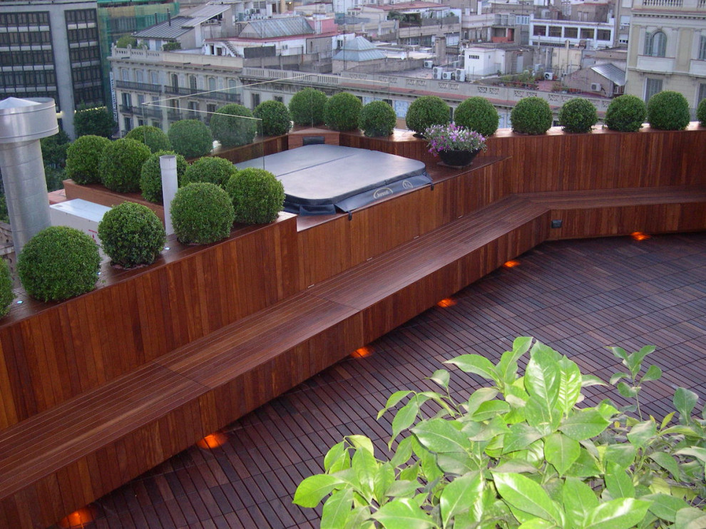 Idées déco pour un toit terrasse contemporain de taille moyenne avec des solutions pour vis-à-vis.