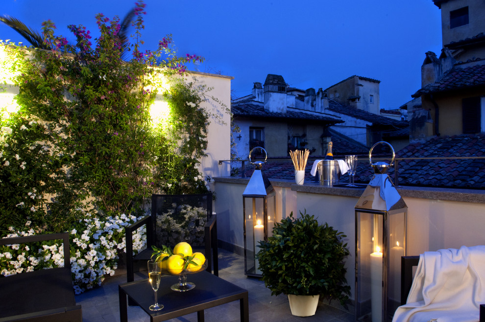 Small mediterranean roof terrace in Rome.