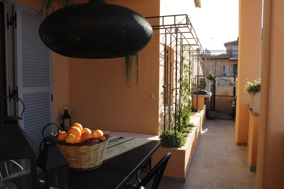 Outdoor kitchen deck - small contemporary rooftop outdoor kitchen deck idea in Rome with a pergola