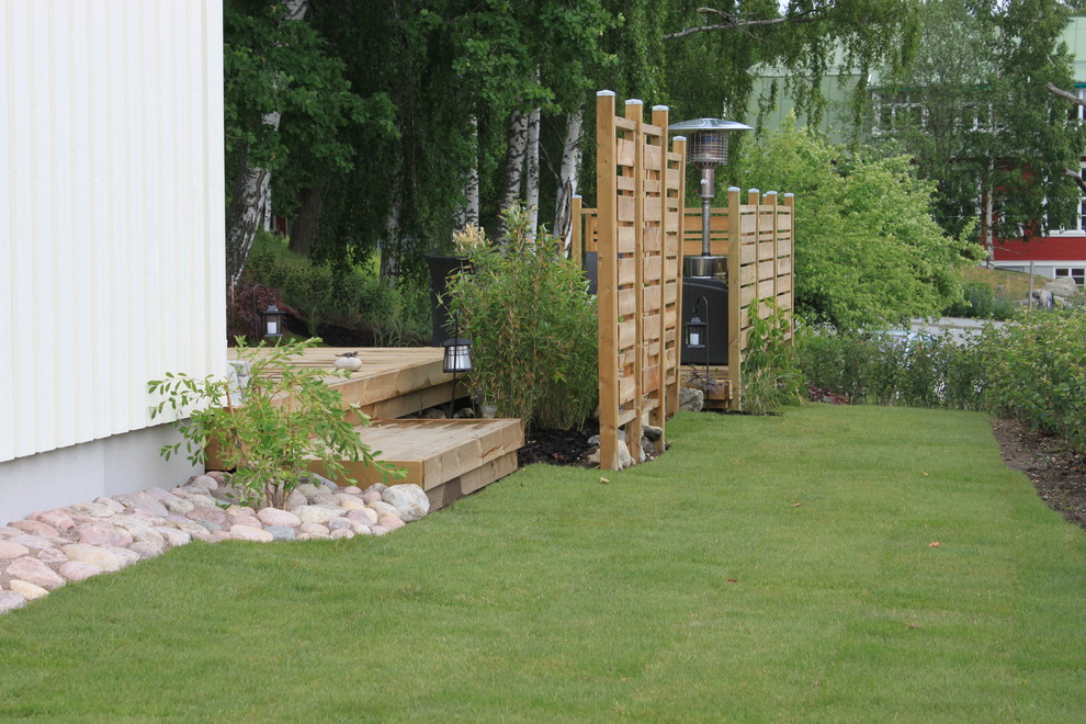 На фото: участок и сад в скандинавском стиле