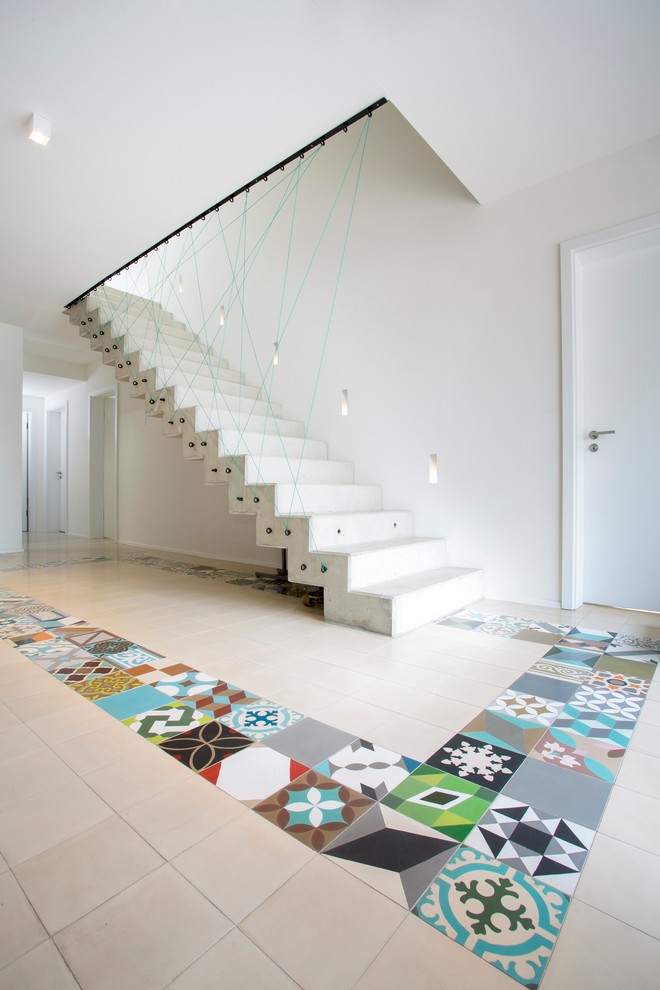 Источник вдохновения для домашнего уюта: прямая бетонная лестница среднего размера в современном стиле с бетонными ступенями