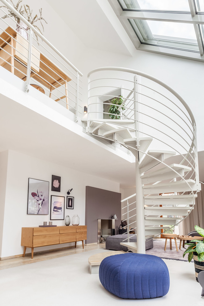 Mittelgroße Moderne Treppe mit Metall-Setzstufen und Stahlgeländer in Sonstige