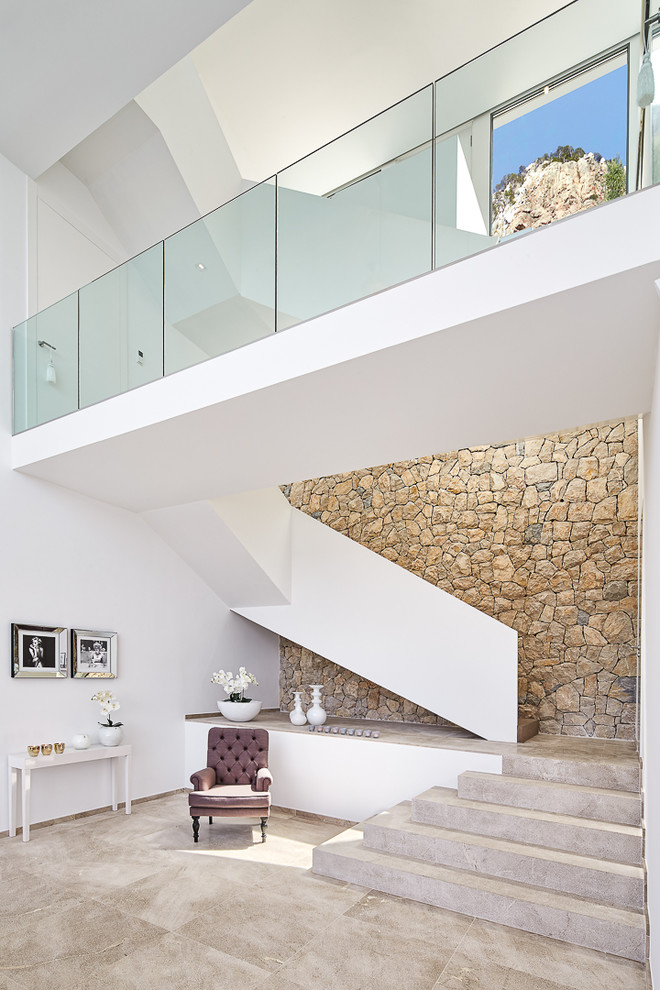 This is an example of a medium sized contemporary staircase in Palma de Mallorca.