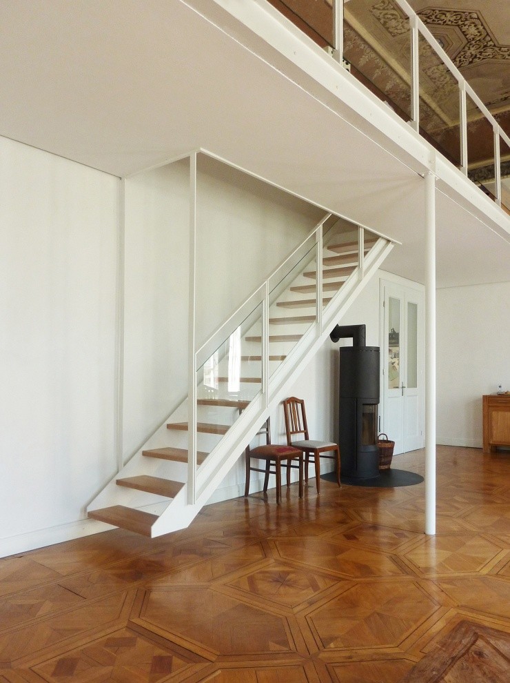 Design ideas for a small scandinavian wood straight staircase in Hanover with open risers.