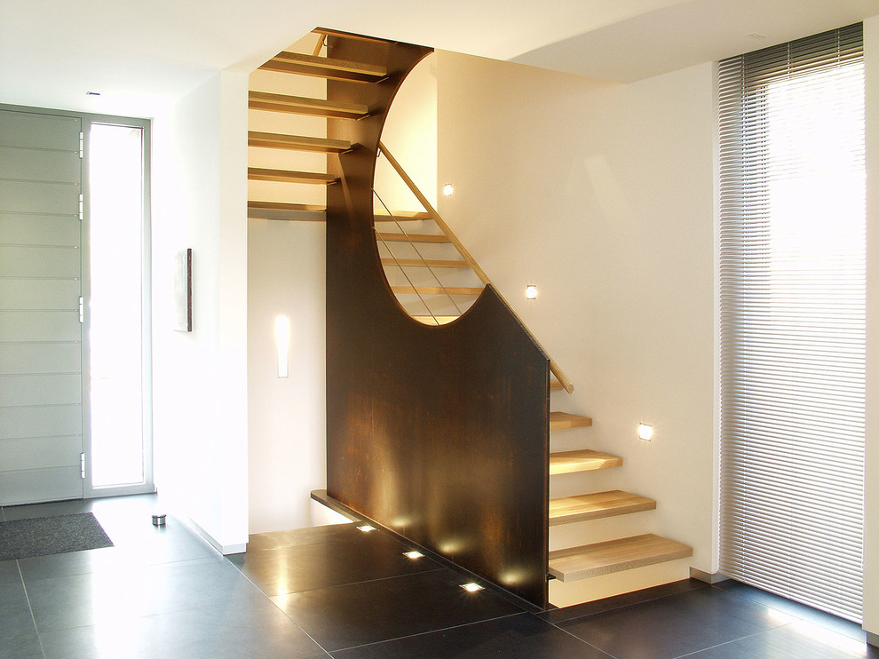 Mittelgroße Stilmix Treppe in L-Form in Köln