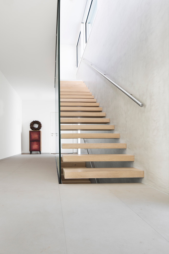 Staircase - contemporary staircase idea in Munich