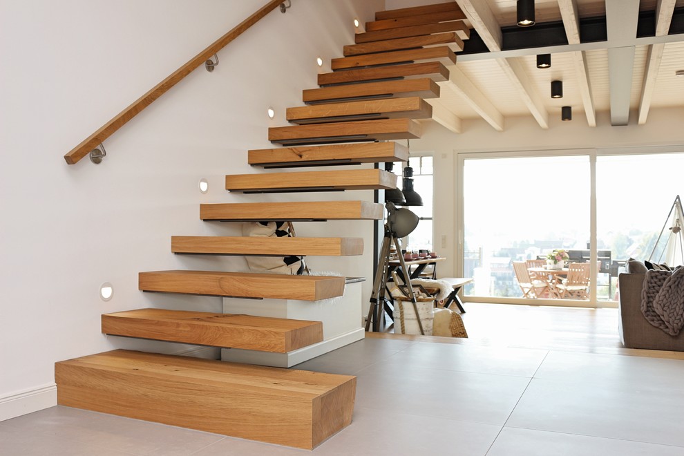 На фото: лестница среднего размера в стиле лофт