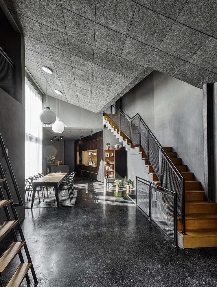 Inspiration for a large industrial staircase remodel in Cologne