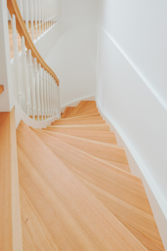 Design ideas for a rural wood wood railing staircase in Frankfurt with wood risers.