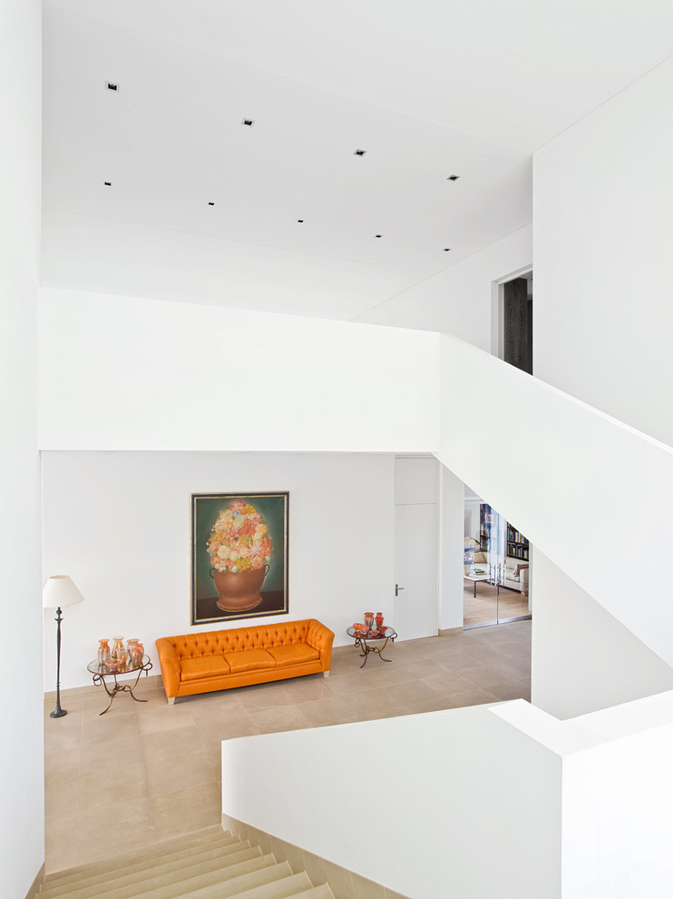 Inspiration for a large contemporary u-shaped staircase in Stuttgart with feature lighting.